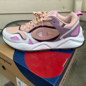 Champion, size 11, shoes are pink , purple, and white